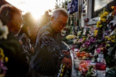 A Japanese family of Bali bombing victims pays respect at Ground Zero. JP/Anggara Mahendra