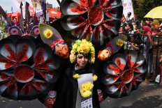 A participant performs at the carnival. JP/Aman Rochman