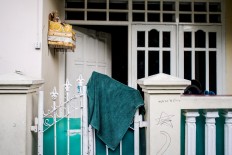 An offering is put in front of a Balinese Hindu family on Kampung Sukarno. JP/Anggara Mahendra
