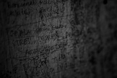 Expressing feelings: A scribbled graffiti reads "depression", "mental disorder" and "stress" on
the door of Rumah Peduli Sahabat Kasih in Cisauk, Banten. JP/Seto Wardhana