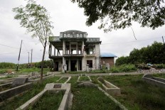 The frame of a home still stands 13 years after the tsunami struck Aceh. JP/Hotli Simanjuntak
