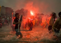 Revellers take part in the traditional 'Bain de Givres' as part of the New Year's celebrations on January 1, 2018 at Malo-Les-Bains beach in Dunkirk, northern France. AFP/Philippe Huguen  