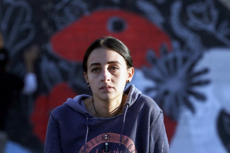 Jordanian graffiti artists brighten Amman's drab streets