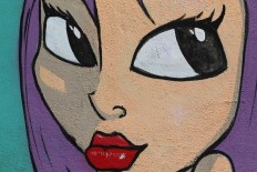 A picture taken on December 18, 2017 shows a graffiti mural on a wall in the Jordanian capital Amman. A tiny group of graffiti artists are on a mission -- daubing flowers, faces and patterns across the capital Amman to bring more colour to the lives of its four million inhabitants.
In a conservative society like Jordan's, the graffiti artists have constantly had to challenge convention to carve out a niche for their works, though still with limits as they steer away from politics and religion. AFP/Khalil Mazraawi 