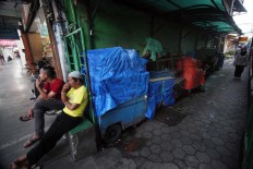 Carts owned by street vendors are stored in an alley on Malioboro. JP/Boy T. Harjanto