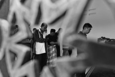 Some patients join in a mass prayer. Antara/Hafidz Mubarak