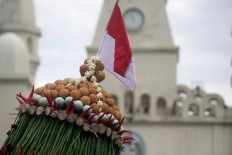 Offering: Fruit and vegetables are piled up together in what is known as a gunungan. JP/Maksum Nur Fauzan
