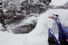 A snow cutter is used by villagers to remove thick snow. JP/Anggara Mahendra