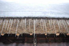The triangle roofs have been able to withstand thick snow and ice for centuries. JP/Anggara Mahendra