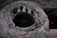 A bronze smelting furnace is one of Achmad's experiments in his home industry. JP/Magnus Hendratmo