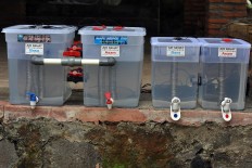 The Sedulur Banyu community of Klaten, Central Java, presented plastic containers used to process rain into alkaline water. Pastor Vicentius Kirjito has taught the people on the slopes of Mount Merapi in Klaten, Central Java, to process rainwater into clean water. JP/Magnus Hendratmo