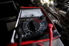 An ammeter, one of the tools used to diagnose the problem with a TV set. JP/Boy T. Harjanto