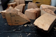 The old and dried briar wood is perfect as material for a tobacco pipe due to its solid wood grain. JP/Arya Dipa