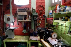 Edy buys a lathe machine to produce pipes after selling his camera and motorcycle. JP/Arya Dipa