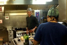Iron chef: The ship’s chef Daniel (left), prepares food in his galley. JP/Jerry Adiguna