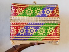 Final product: A worker shows a keben with the nagasari motif. JP/Agung Parameswara