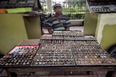 Doyok has been selling gemstones since the 1990s. JP/Boy T. Harjanto