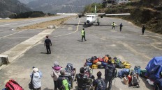 The journey begins: Travelers wait for their seven-minute flight from Phaplu Airport to Tenzing-Hillary Airport in Lukla. JP/ Adeline Sunarjo