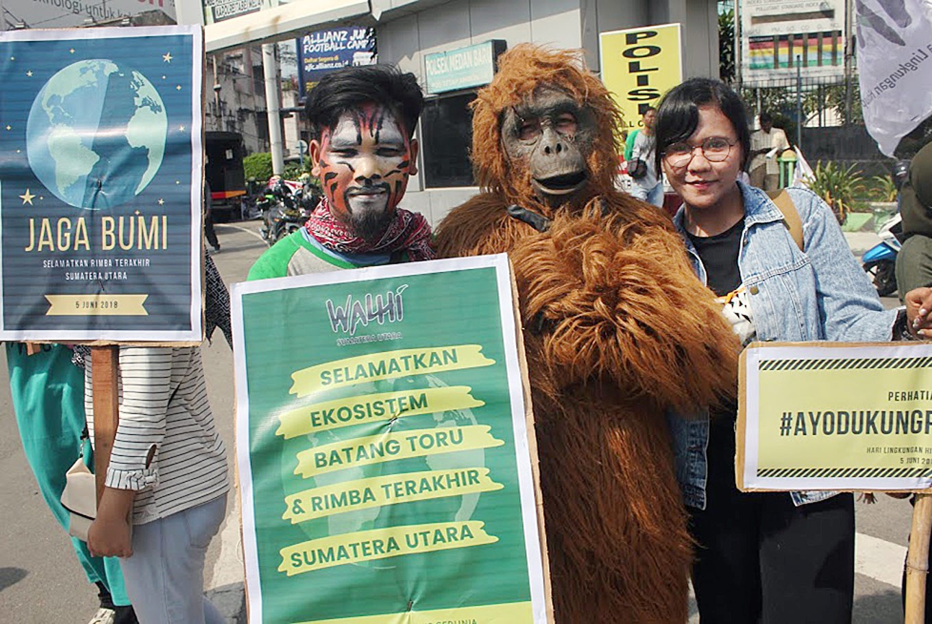 Environmentalists, some dressed in animal costumes and face paint, stage a peaceful rally in Medan, North Sumatra to mark World Environment Day. 