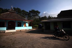 A motorcyclist leaves an empty mosque in Balerante village. JP/Boy T. Harjanto