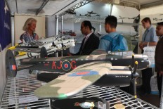 Model planes: Visitors stand near miniature planes at the Farnborough International Airshow. JP/ R. Berto Wedhatama
