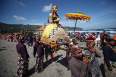The Dewi Sri statue, which villagers believe is the goddess of rice, is also floated to the sea. JP/Boy T. Harjanto