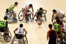 Indonesia (white jerseys) plays against Malaysia at the Indonesia Para Games Invitational Tournament at Gelora Bung Karno sporting complex in Senayan, Jakarta, on Sunday, July 1, 2018. Indonesia won 54-53. JP/Dhoni Setiawan