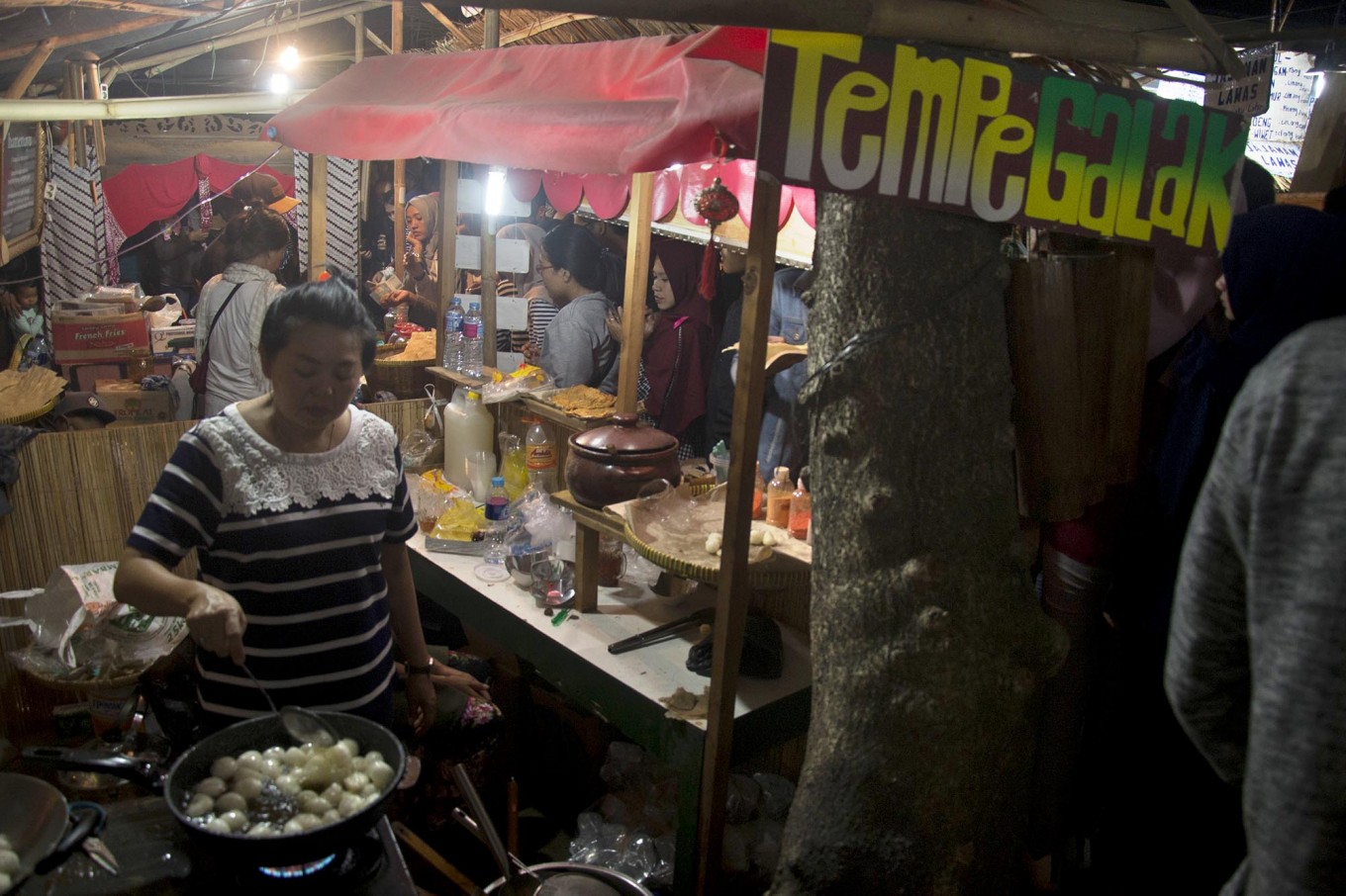 The sign for a fried tempeh seller named “Tempe Galak”, literally translating to fierce tempeh. JP/Tarko Sudiarno