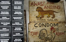 Catchy phrases on boards are on display at one of the stores. JP/Tarko Sudiarno