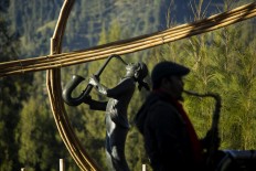 Fine art: A sculpture of Jazz Gunung by renowned artist Dolorosa Sinaga adorns the festival. JP/Tarko Sudiarno