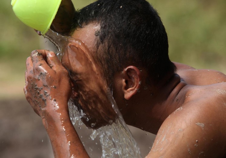 Mud soccer commemorates Independence Day