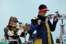 Khazakstan's, Alexandra Malinovskaya competes in the women's 10m rifle during the 2018 Asian Games in Palembang on August.20. JP/ Jerry Adiguna