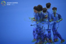 Thai hockey player Intani Norrawich plays against Oman in a preliminary round of men’s hockey at the GBK Hockey Field. Thailand lost to Oman 2-0 on Friday, August. 24. Inasgoc via Antara/ Dhoni Setiawan