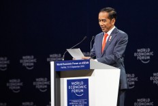 Four years under Jokowi: Half-full or half-empty?