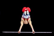 Chinese Taipei's Tang Chia Hung performs during the artistic gymnastic men's bar competition. JP/Seto Wardhana