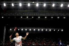 Indonesia's Jonatan Christie performs in the badminton men's single final against Chinese Taipei's Chou Tien Chen. He won the gold. JP/Seto Wardhana