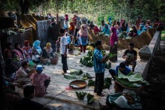 Villagers gather to start the ritual after the harvest at the Wonosadi customary forest. JP/Anggertimur Lanang Tinarbuko