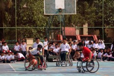 Athletes have a fun session with high school students in Surakarta, Central Java. JP/Maksum Nur Fauzan