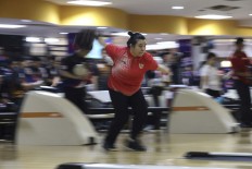 Swerve it: Indonesian bowler Elsa Maris gets into the action during the women&rsquo;s singles tenpin bowling competition at the Jaya Ancol Bowling Center in Jakarta. She won gold. INAPGOC/TJPimages/Agoes Rudianto