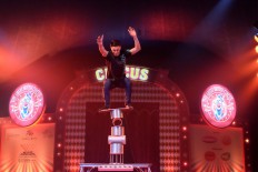 Steady: A circus performer show cases his balancing skills in the rolla bolla act. JP/Vellen Augustine