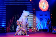 Manliest man: An acrobat plays a character who claims he is so strong that he can beat a polar bear. JP/Vellen Augustine
