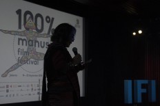 The silhouette of Magdalena Sitorus, National Commission on Violence Against Women (Komnas Perempuan) commissioner can be seen during the opening of the festival. JP/Rosa Panggabean