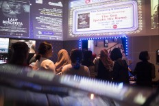 Visitors line up to watch Laut Bercerita (The Sea Speaks His Name) a movie about the kidnapping of university students in 1998 in @america. JP/Rosa Panggabean