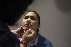 A member of the Pelita Monas Foundation gets ready to perform during Express to Impress in @america. JP/Rosa Panggabean