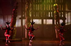 Three female dancers perform the Kinyah Mandau dance during the show. JP/Wienda Parwitasari