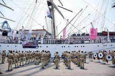 Cadets from the merchant marine academy (STIP) welcome the docking of vessel Dar Mlodziezy from Poland with a marching band performance at Tanjung Priok Port in Jakarta, on Tuesday, October 2, 2018. Indonesia is the 10th country visited by the Polish ship, which is sailing around the world in commemoration of a century of Polish independence. JP/David Caessarre