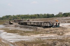  Siem’s salt farm is the only one left in the village. JP/Maksum Nur Fauzan