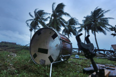 Forlorn: Musical instruments belonging to pop band Seventeen can still be found scattered on the ground on Sunday, December 23. 2018. Several members of the band died after a tsunami hit Tanjung Lesung Resort, Pandeglang, Banten, on Saturday. The National Disaster Mitigation Agency (BNPB) reported that as of Tuesday, 429 people had been killed in the catastrophe. JP/Dhoni Setiawan