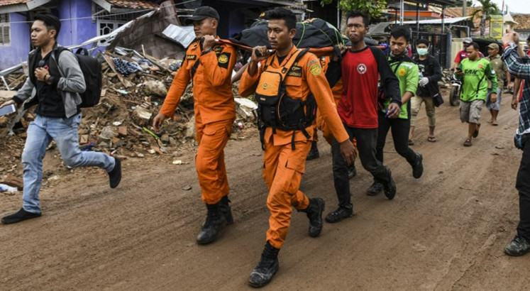 Rescuers reach residents of Tsunami struck towns