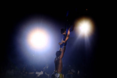 Breathtaking: Two acrobats keep the audience on the edge of their seat. JP/Dhoni Setiawan